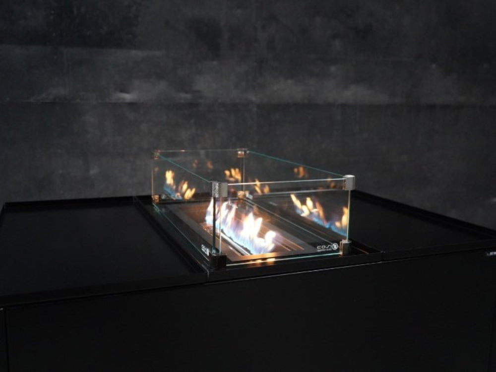 Glas til ildbord som beskytter flammer mod vind