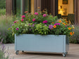 CUBY plantekasse på hjul i galvaniseret stål med blandede blomster