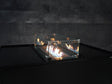 Glas til ildbord som beskytter flammer mod vind